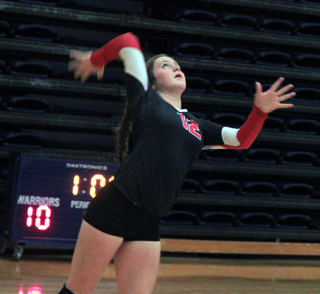 Angela Wemhoff stood out at the service line against Kamiah at District.