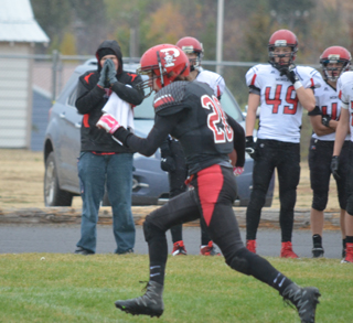 Hunter Chaffee with the ball after making an interception. He wound up taking the ball all the way to the end zone. Photo by Shari Chaffee.