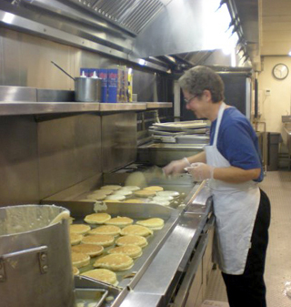 Sister Wendy cooking for firefighters.