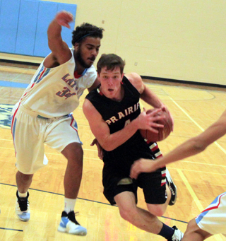 Patrick Chmelik takes the ball into the lane against Lapwai.