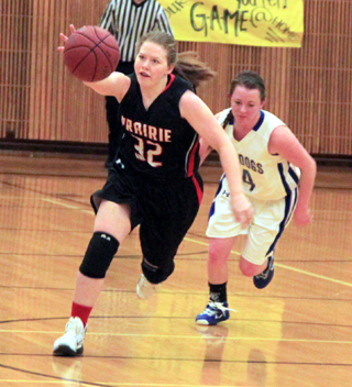 India Peery reaches for the ball that she had just knocked loose for a steal at Genesee.