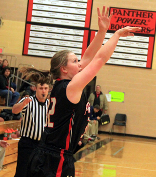 India Peery hits one of her four 3-pointers at Asotin.