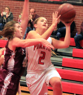 Kylie Tidwell scores on a lay-up against Kamiah.