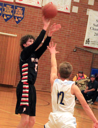 Hunter Chaffee shoots for one of his 6 made e-pointers at Genesee after also hitting 6 two nights earlier at Kamiah.