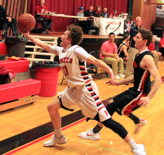 Gavin Branson saves the ball from going out of bounds in the Moscow game.