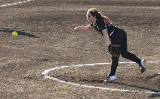 Faith Uhlenkott sends a pitch towards the plate.