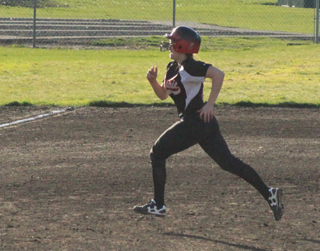 Sam Remacle heads for third on one of her two triples at Culdesac.