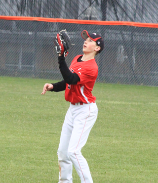 Damian Forsmann is about to make a catch in right field against Soda Springs.