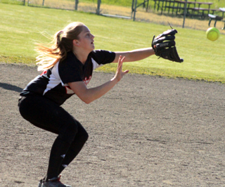 Kylie Tidwell is about to make a catch at shortstop against Kendrick.