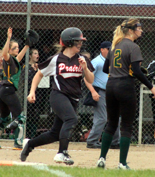 Faith Uhlenkott with a first inning single against Potlatch that helped Prairie score 3 in the inning.