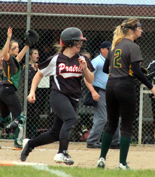 Faith Uhlenkott with a first inning single against Potlatch that helped Prairie score 3 in the inning.