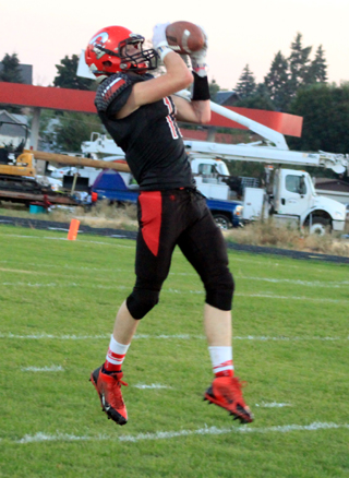 Nick Mager makes a leaping catch against Salmon River.