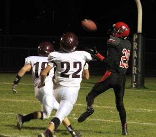 Hunter Chaffee is about to catch a pass at about the 7 yard line and then score a touchdown.