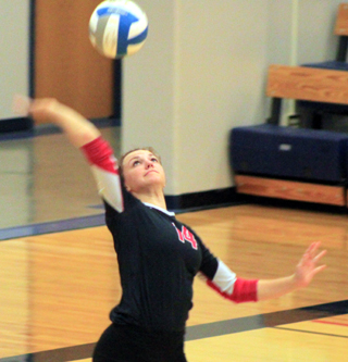 Kristyna Krogh serves against Potlatch at District.