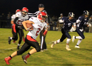 Jake Stubbers broke loose for a 67 yard touchdown run on Prairies second offensive play of the game. Also shown is Hunter Chaffee.