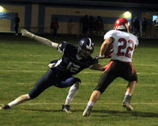Owen Anderson fakes out a Lapwai defender, leaving him grasping at air, on the way to a touchdown.