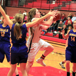 Angela Wemhoff scores 2 of her 19 second quarter points against the Lewiston JV.