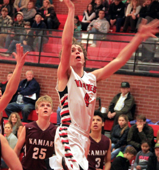 Nick Mager scores on a lay-up against Kamiah.