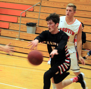 Hunter Chaffee makes a pass in the game at Asotin.