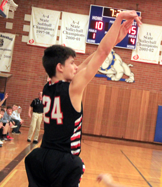 Devin Ross shoots from the corner at Genesee.