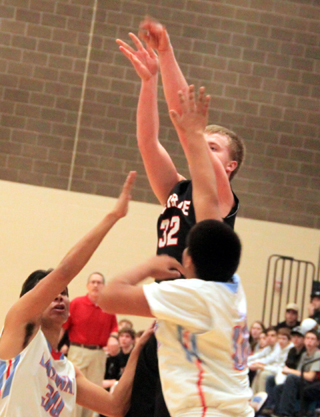 Spencer Schumacher hits a buzzer beating 3 at the end of the first half at Lapwai.