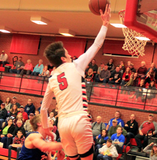 Hunter Chaffee scores a lay-up against Genesee.