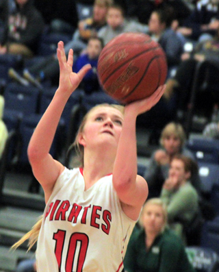 Jordyn Higgins scores 2 of her game-high 22 points against Potlatch at District.