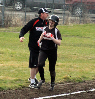 Josie Peery trots home after hitting a 2-run homer at Culdesac.
