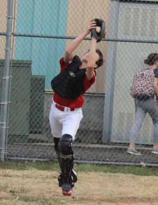 Catcher Sam Mager catches a foul pop-up at C.V.