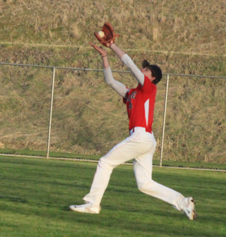 Nick Mager makes a running catch in right field in the second Lapwai game.