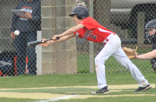 Dalton Ross connects for one of his 3 bunt singles against Troy.