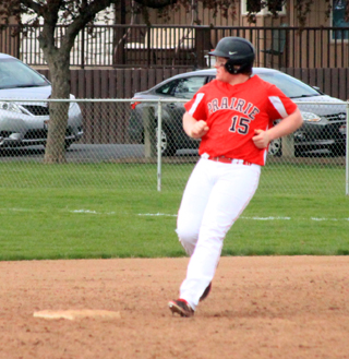 Dereck Arnzen pulls into second after hitting a 3-run double against Troy on Saturday.