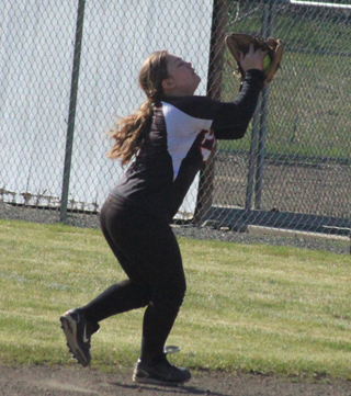 Jade Peery catches an infield flyball against Lewis County.