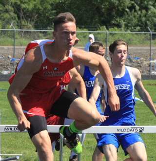 Sean Spencer had a good lead by the third hurdle as he went on to win the 110 hurdles race and qualify for state.