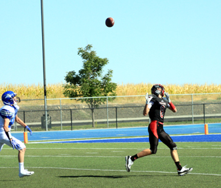Damian Forsmann is about to catch a long pass from Spencer Schumacher for Prairies first touchdown against Valley.