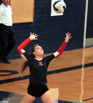 Ashton Landers during a 7-point service run that helped Prairie win their opening game at Grangeville.