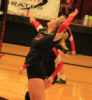 Jordyn Higgins saw her first action in a couple of weeks on senior night as she goes for a spike against Grangeville.