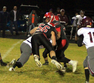 Prairie defenders lived in Kamiahs backfield as Carson Schmidt, Caleb McWilliams and Michael Schwartz stuff a Kamiah runner for a loss.