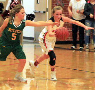 Jordyn Higgins makes a steal against Potlatch.