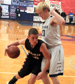 Owen Anderson gets bumped by a Grangeville defender.