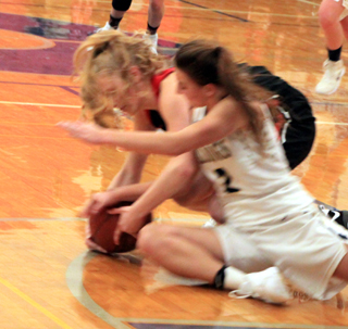 Theresa Wemhoff goes after a loose ball at Grangeville.