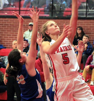 Ellea Uhlenkott scores a lay-up against Genesee.