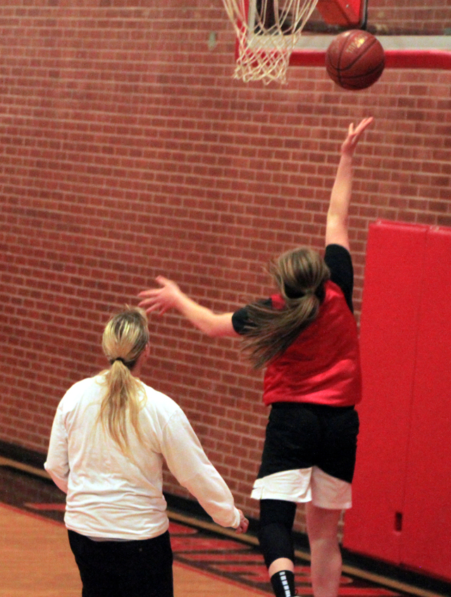 Ellea Uhlenkott scores a lay-up against Genesee.