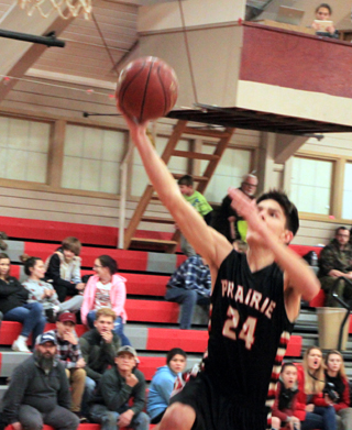 Devin Ross goes up for a dunk after a C.V. turnover.