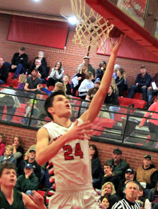 Devin Ross scores a lay-up against Potlatch.