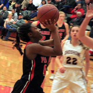 Madison Shears puts up a shot against Shoshone.