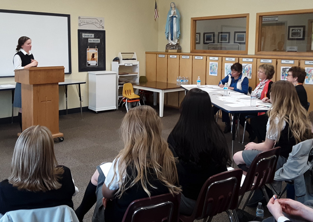 Jade Prigge passes the ball in Erin Chmeliks direction.