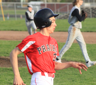 Dalton Ross reaches first on an RBI single at Kamiah.