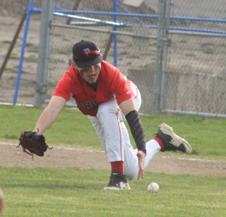 Frist baseman Chase Kaschmitter goes after a ground ball at Genesee.
