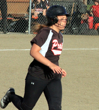 Ashton Landers pulls into first with a single against Troy during the play-in game.